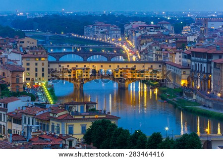 River Arno and famous bridge Ponte Vecchio at twilight from Piazzale Michelangelo in Florence, Tuscany, Italy