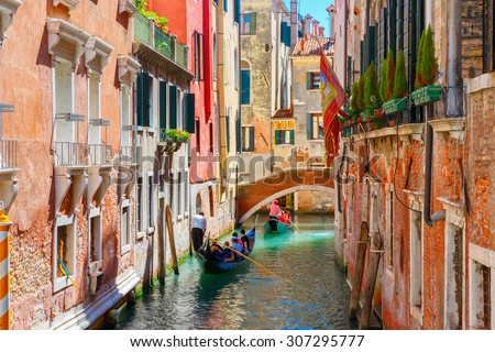 Picturesque view of Gondolas on lateral narrow Canal, Venice, Italy.