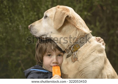 Child eating ice cream with your dog