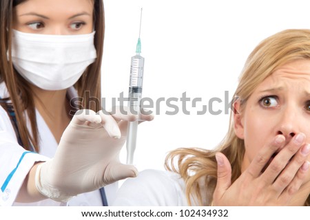 doctor giving needle in hand doctor giving needle in hand