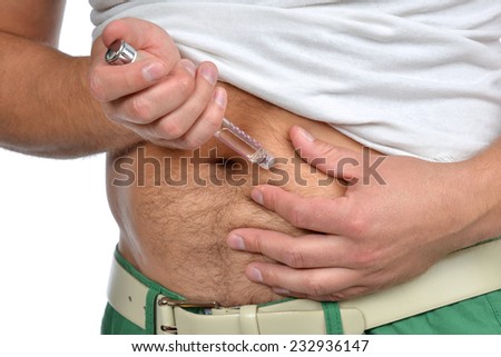 Doctor making diabetes patient insulin shot by syringe with dose of lantus, subcutaneous abdomen vaccination isolated on a white background