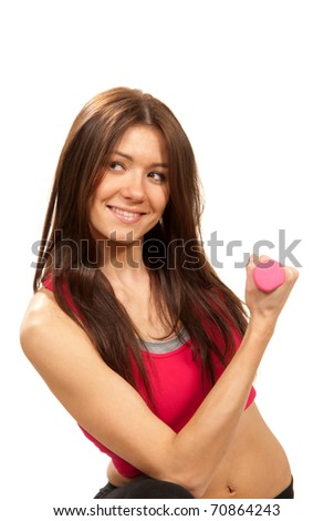 Pretty brunette fitness woman instructor on diet with perfect athletic body and abs workout with pink mini weights dumbbells in gym isolated on a white background