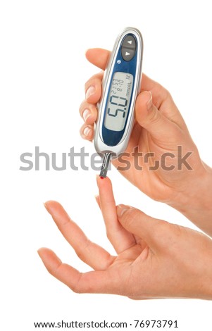 Dependent first type Diabetes patient measuring glucose level blood test using ultra mini glucometer and small drop of blood from finger and test strips isolated on a white background Dependent first type Diabetes patient measuring glucose level blood test using ultra mini glucometer and small drop of blood from finger and test strips isolated on a white background