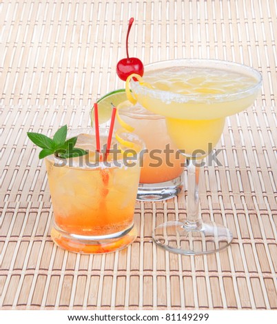 Margarita cocktail, Long island iced tea and tequila sunrise cocktails with alcohol
