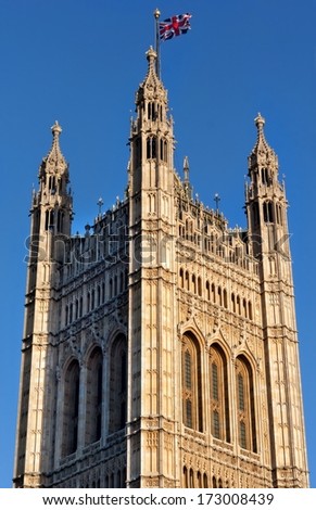 Tower of British Parliament with flag