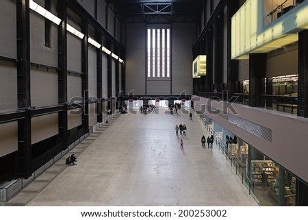 LONDON, UNITED KINGDOM - MARCH 24: The Turbine Hall in Tate Modern Art Gallery on March 24, 2014 in London. Tate Modern, Britain\'s national gallery of modern art, is based in former power station.