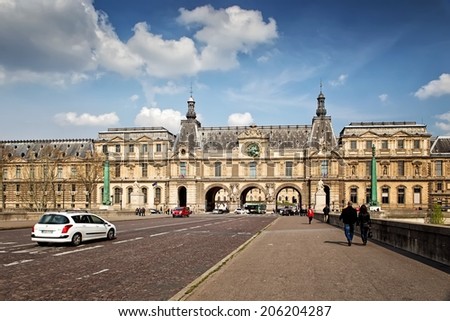 PARIS, FRANCE - MARCH 27: Louvre museum in Paris on March 27, 2014. The museum is housed in the Louvre Palace, originally built as a fortress in the late 12th century under Philip II.