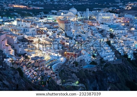 SANTORINI, GREECE, AUGUST 23: Night view of Fira, Santorini. Fira is the main stunning cliff-perched town on Santorini, member of the Cyclades islands, Aegean sea.