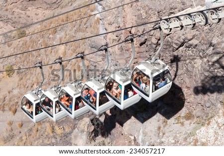 SANTORINI, GREECE, AUGUST 22: The Santorini cable car on August 22, 2014. The cable car connects the port with the capital Fira. It is a donation of the Loula and Evangelos Nomikos Foundation.