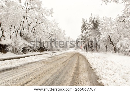 Snowy road at winter. Adverse weather conditions
