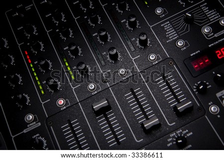 DJ mixer at work in studio