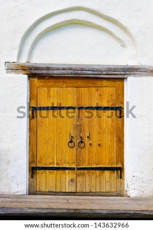 Side door of medieval church in Veliky Novgorod, Russia