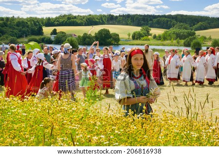 MURANOVO - JULY 20: Russian traditional festival at the end of the haying. On July 20, 2014 in Museum-Reserve Muranovo named after F.Tyutchev. Moscow region, Russia