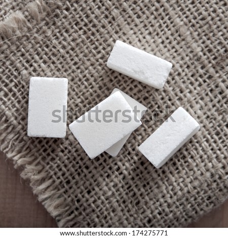 Close up photo of sugar cubes on table