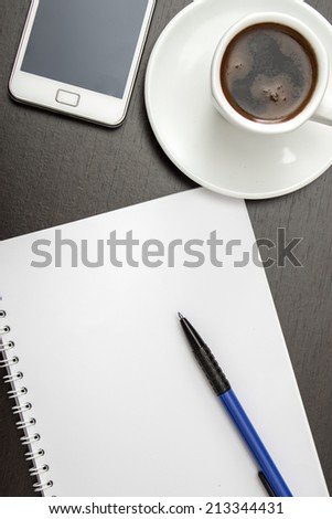 office desk composition with blank paper, from above