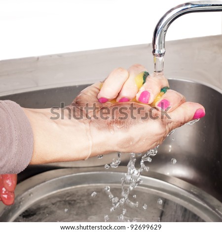 washing of dirty sponges in dirty hand