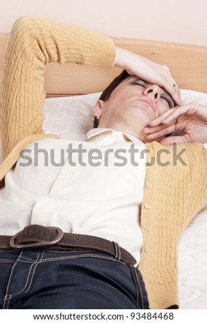 Woman having head ache holding hands on forehead