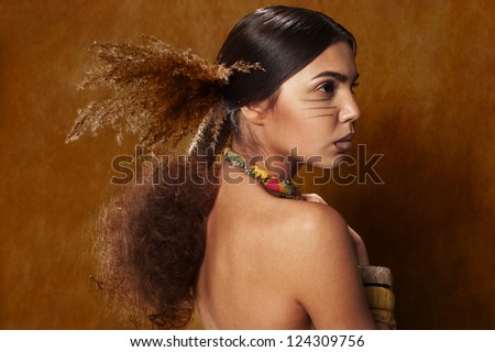 Woman in ethnic dress in the studio