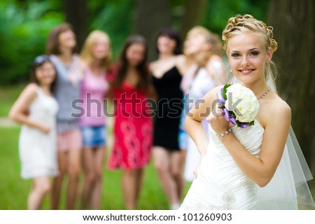 the bride and her friends are in the park