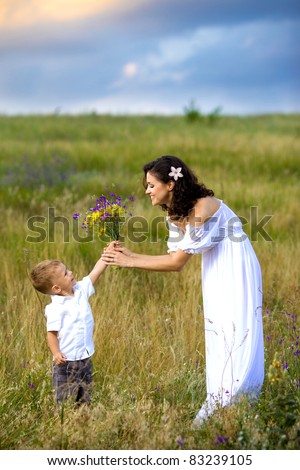 son gives mom flowers