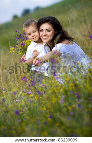 son and mom on the nature of flowers