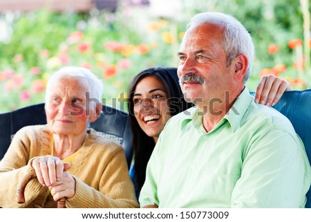 Smiling old man visiting her elderly mother in the nursing home Smiling old man visiting her elderly mother in the nursing home