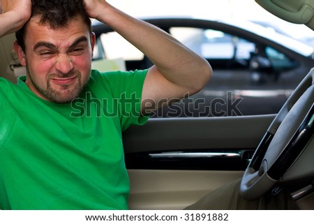 stock-photo-a-portrait-of-an-angry-driver-sitting-in-his-car-displeased-31891882.jpg