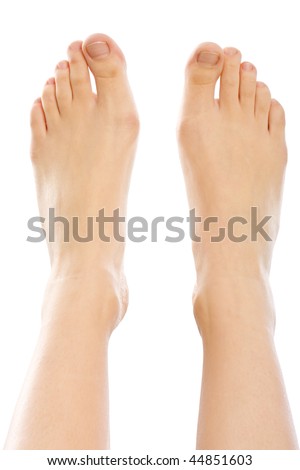 stock photo A young woman's feet closeup isolated on white
