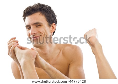 stock photo A mature man massaging his girlfriend's wife's feet