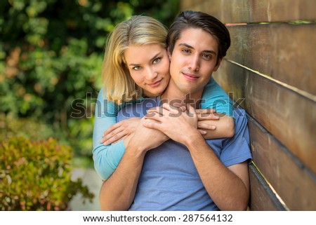 Beautiful couple portrait of lovers embrace and sweet smile