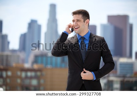 Business man downtown on a cell phone talking finance busy in a meeting city