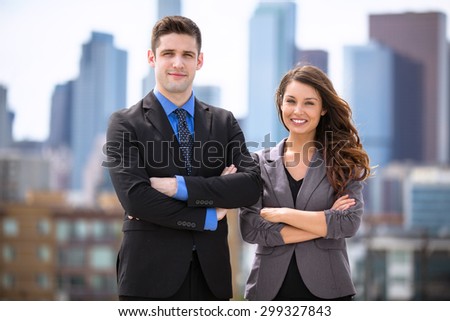 Business attorneys arms crossed portrait in the city downtown