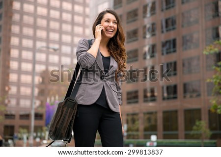 Business woman on way to work young executive successful happy smile walking city