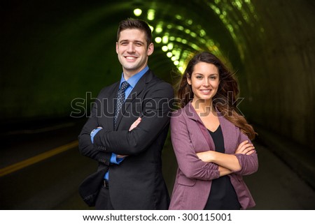 Legal team portrait confident interesting background tunnel street city urban environment