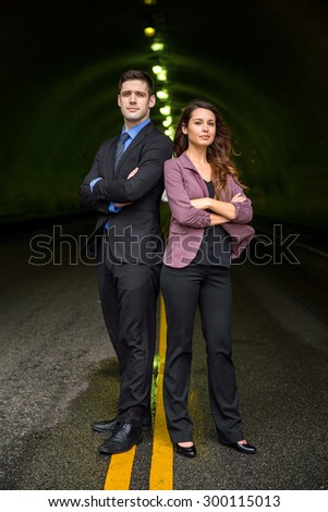 Business people executive standing in middle street city urban portrait confident interesting background