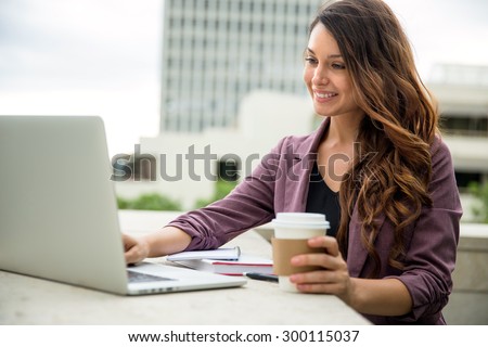 Beautiful young writer college student blogger journalist web internet computer with coffee