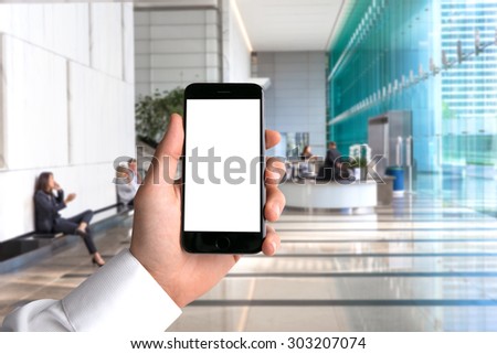 Blank card cell phone smartphone hand POV business man background workplace office perspective point of view