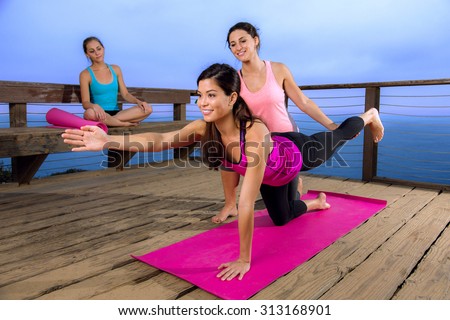 Beautiful model female woman yoga pose personal trainer class instructor friends retreat