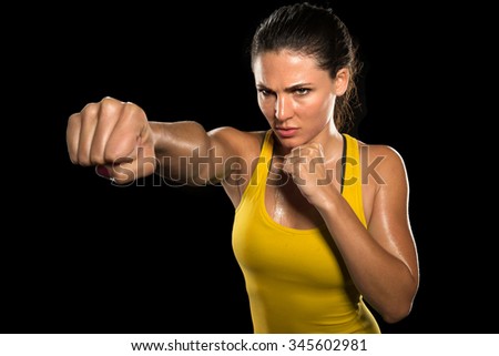 MMA woman fighter tough chick boxer punch pose pretty exercise training cross fit athlete