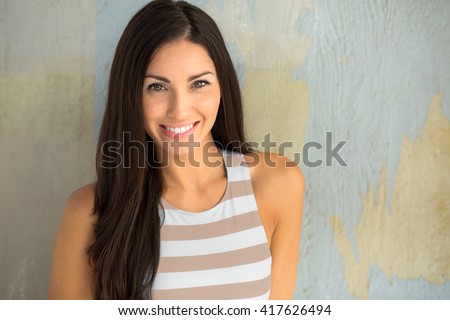Lively cute adorable pretty young lady with charming smile youthful spirit positive independent confident woman