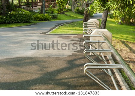empty bicycle rack for parking bicycles in park