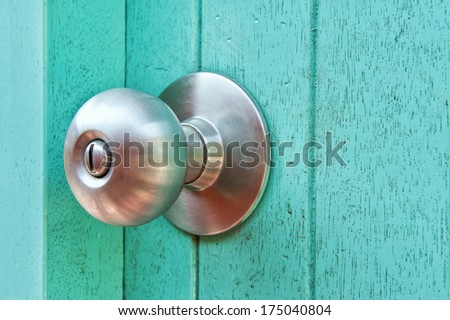 Door knob on the old wooden door
