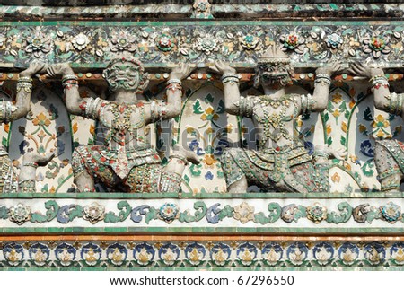 Guardian statue (yak) at the temple Wat Arun, one of the major tourism attractions in Bangkok, Thailand