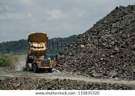 Dump truck carrying crushed rock. Panama Canal, Panama, Central America