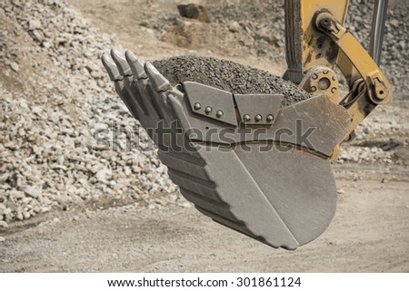 Shovel excavator in Action moving construction gravel, Panama, Central America