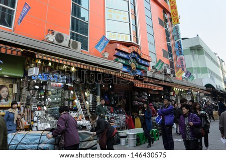 SEOUL - APRIL 23: Street view of Nam Dae Mun Market, crowd present, on April 23 2013, Seoul, South Korea. This is the oldest, dates back to 1414, and largest traditional market in South Korea.