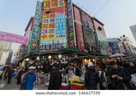 SEOUL - APRIL 23: Street view of Nam Dae Mun Market, crowd present, on April 23 2013, Seoul, South Korea. This is the oldest, dates back to 1414, and largest traditional market in South Korea.