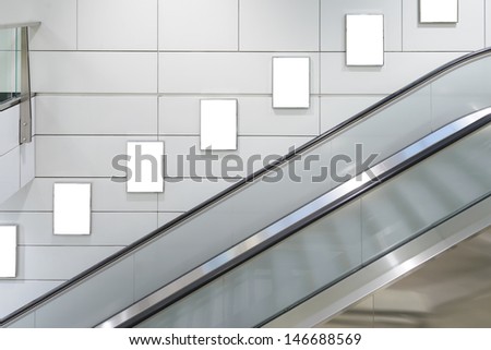 Five big vertical / portrait orientation blank billboard with escalator background