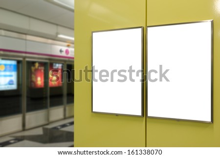 Two big vertical / portrait orientation blank billboard in public transport