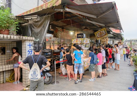 Shifen, Taiwan - May 17, 2015 : The Shifen Old Street section of Pingxi District has become one of the famous tourist stops along this line.